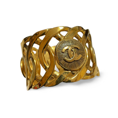 Vintage Chanel golden nice and heavy bangle with sunburst CC mark motif. Must have gorgeous jewelry. 051212ac1