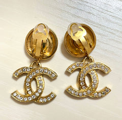 Vintage CHANEL dangle earrings with crystal CC motif and round logo embossed motif on top. Gorgeous vintage Chanel jewelry. 061214y1