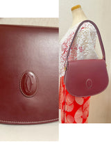 Vintage Cartier wine, bordeaux leather shoulder bag with embossed logo, purse from must de Cartier collection. Great daily bag. 070128ac3