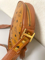 Vintage MCM brown monogram round Suzy Wong shoulder bag with brown leather trimmings. Designed by Michael Cromer. Unisex. 070325ac4