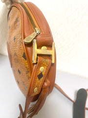 Vintage MCM brown monogram round Suzy Wong shoulder bag with brown leather trimmings. Designed by Michael Cromer. Unisex. 070325ac4