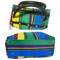 Vintage Gianni Versace duffle handbag in blue, yellow, green and other color fabric and black leather combination. 060810y1