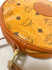 Vintage MCM brown monogram round Suzy Wong shoulder bag with brown leather trimmings. Designed by Michael Cromer. Unisex. 070325ac4