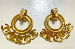 1990s. Vintage CHANEL Gold tone extra large hoop dangle earrings with dangling mini CC mark motifs. Must have gorgeous jewelry. 070617ac1