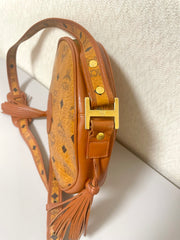 Vintage MCM brown monogram round Suzy Wong shoulder bag with brown leather trimmings. Designed by Michael Cromer. Unisex. 070325ac4