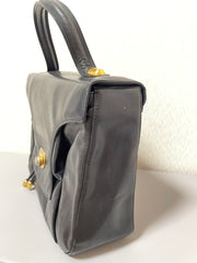 Vintage Bally black leather retro pop design bag, business purse with gold tone drawstrings and unique flap cut design.  Unisex use. 160315