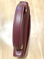Vintage Cartier wine leather handbag with gold-tone closure. les must de cartier collection. Made in Italy. Classic and elegant. 080114tr4