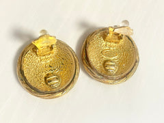 1990s. Vintage CHANEL golden round earrings with twisted frames and CC mark. Classic vintage Chanel jewelry. 070624ac1