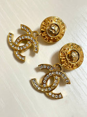 Vintage CHANEL dangle earrings with crystal CC motif and round logo embossed motif on top. Gorgeous vintage Chanel jewelry. 061214y1