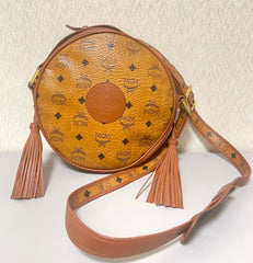 Vintage MCM brown monogram round Suzy Wong shoulder bag with brown leather trimmings. Designed by Michael Cromer. Unisex. 070325ac4