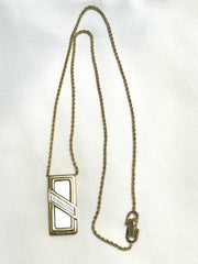 Vintage Christian Dior golden skinny chain necklace with logo embossed rectangular pendant top. 070131ys2