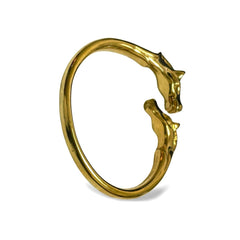 Vintage Hermes golden double horse head design bangle, bracelet. Beautiful classic jewelry from Hermes. 060220m
