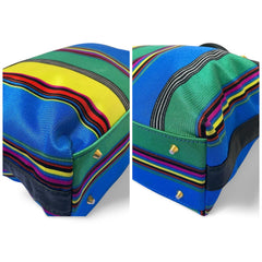 Vintage Gianni Versace duffle handbag in blue, yellow, green and other color fabric and black leather combination. 060810y1
