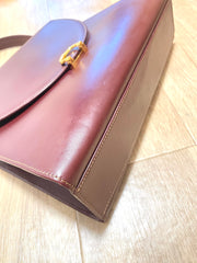 Vintage Cartier wine leather handbag with gold-tone closure. les must de cartier collection. Made in Italy. Classic and elegant. 080114tr4