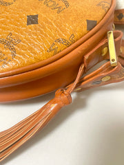 Vintage MCM brown monogram round Suzy Wong shoulder bag with brown leather trimmings. Designed by Michael Cromer. Unisex. 070325ac4