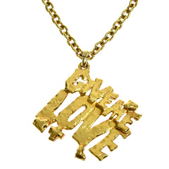 Vintage Moschino golden chain necklace with Give Me Love pendant top. Must have classic jewelry piece. 060914y1