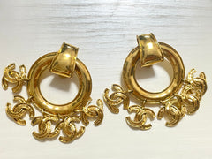 1990s. Vintage CHANEL Gold tone extra large hoop dangle earrings with dangling mini CC mark motifs. Must have gorgeous jewelry. 070617ac1