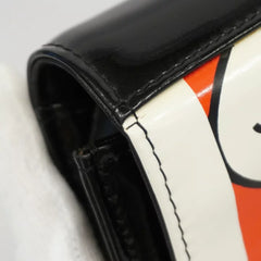 Vintage CHANEL patent enamel clutch bag, wristlet in mademoiselle portrait, Just a drop of Number 5, in black, yellow, and red.  050907rk1