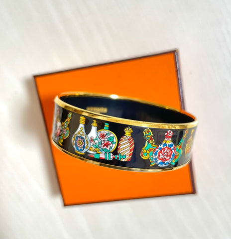 Vintage Hermes cloisonne enamel golden bangle with black and colorful perfume bottle design. Great gift idea. 050510ra3