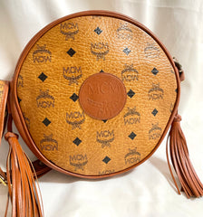 Vintage MCM brown monogram round Suzy Wong shoulder bag with brown leather trimmings. Designed by Michael Cromer. Unisex. 050524ra1