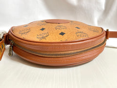 Vintage MCM brown monogram round Suzy Wong shoulder bag with brown leather trimmings. Designed by Michael Cromer. Unisex. 050524ra1