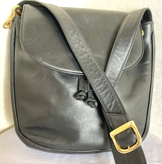 Vintage Moschino black leather shoulder bag with golden cute dangling charms. Heart, safety pin, trumpet, sacks, and guitar. 050725