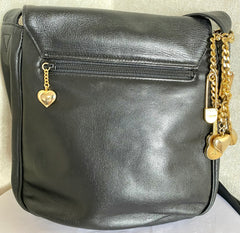 Vintage Moschino black leather shoulder bag with golden cute dangling charms. Heart, safety pin, trumpet, sacks, and guitar. 050725