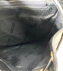 Vintage Moschino black leather shoulder bag with golden cute dangling charms. Heart, safety pin, trumpet, sacks, and guitar. 050725