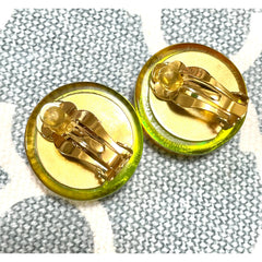 Vintage CHANEL yellow orange tone aurora resin earrings with Chanel iconic charms. Golden shoe, camellia, and CC mark in it. 041228an1