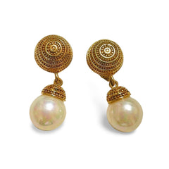 Vintage Nina Ricci golden and white faux pearl dangling earrings. Classic and beautiful jewelry piece. 060421ya
