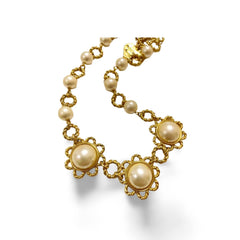 Vintage Moschino twisted chain and faux pearl flower motif statement necklace with heart charm. Moschino BIJOUX. 060208ya