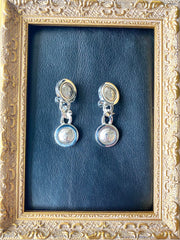 Vintage Gianni Versace silver dangle earrings with medusa faces and chain motif. Must have Lady Gaga style jewelry piece. 050601ya2