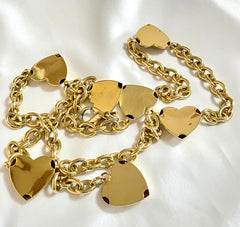 W2 Vintage Moschino golden chain belt with logo embossed heart charms. Can be necklace too. Chic and mod accessory piece. 0407211re5