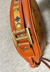 Vintage MCM brown monogram round Suzy Wong shoulder bag with brown leather trimmings. Designed by Michael Cromer. Unisex. 050715ya1