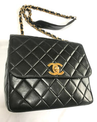 Vintage Chanel classic large black lambskin 2.55 square shape chain shoulder bag with golden large CC closure. Must have purse. 0404081