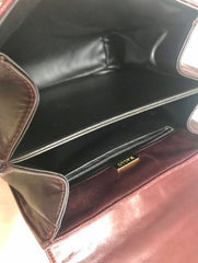 Vintage BALLY wine brown quilted lambskin handbag with golden logo turn lock closure. 050425r1