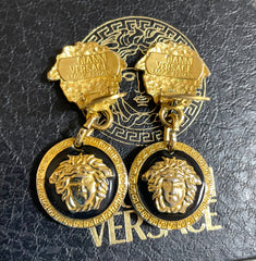 Vintage Gianni Versace medusa face motif dangle earrings with white medusa and black medusa. Lady Gaga style jewelry piece. 050601ya3