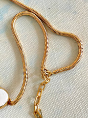 Vintage Christian Dior white flower charm necklace. Rare and one of a kind old jewelry piece. 0410051