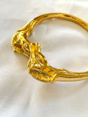 Vintage Hermes golden double horse head design bangle, bracelet. Beautiful classic jewelry from Hermes. 050120an8