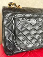 Vintage CHANEL black lamb leather large, jumbo size shoulder bag with big golden CC closure and chain strap. 2.55 classic purse. 050223rc1