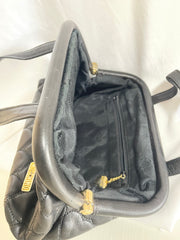 Vintage MOSCHINO black heart shape quilted lambskin mini handbag, tote purse. Too cute to carry.
