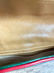 Vintage Gucci GG monogram shoulder bag with red and green webbing color convo shoulder bag. Golden and silver GG motif on the flap. 0411273