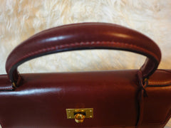 1980s Vintage HERMES Kelly 32 bag rouge ash box calf leather with gold hardware. Exterior stitch. Stamp K in O, 1981. Best known classic bag
