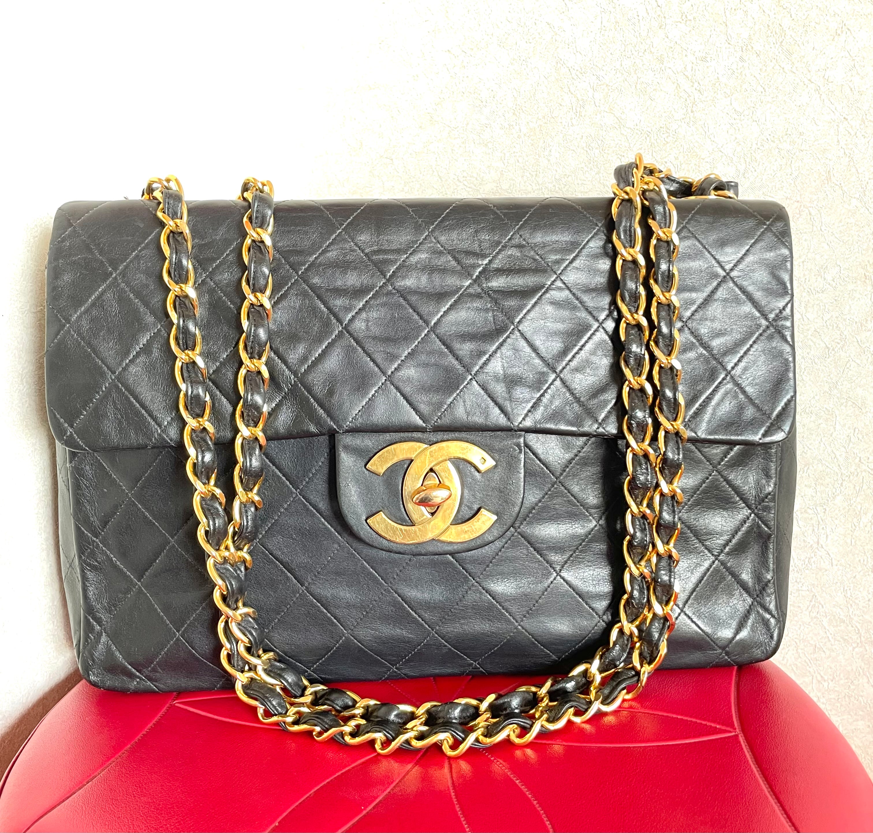 Vintage CHANEL black lamb leather large, jumbo size shoulder bag with big golden CC closure and chain strap. 2.55 classic purse. 050223rc1