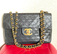 Vintage CHANEL black lamb leather large, jumbo size shoulder bag with big golden CC closure and chain strap. 2.55 classic purse. 050223rc1