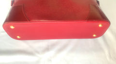 Vintage Christian Lacroix red patent enamel and leather bolide bag with golden logo zipper charm. Comes with shoulder strap. 0403172