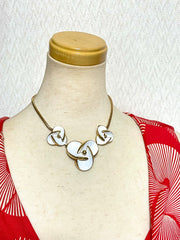 Vintage Christian Dior white flower charm necklace. Rare and one of a kind old jewelry piece. 0410051