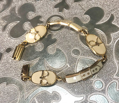 Vintage Roberta di Camerino chain bracelet with white logo charms. Beautiful jewelry.
