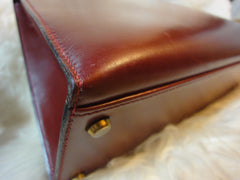 1980s Vintage HERMES Kelly 32 bag rouge ash box calf leather with gold hardware. Exterior stitch. Stamp K in O, 1981. Best known classic bag