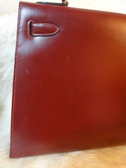 1980s Vintage HERMES Kelly 32 bag rouge ash box calf leather with gold hardware. Exterior stitch. Stamp K in O, 1981. Best known classic bag